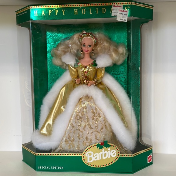 1994 Special Edition Happy Holidays Barbie Gown is gold and...
